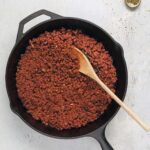 vegan chorizo in a cast iron pan